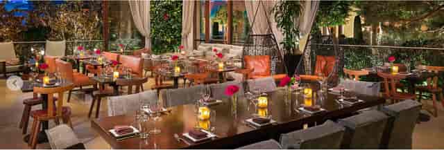 Elegant dining room with candlelight, perfect for corporate events and intimate gatherings.