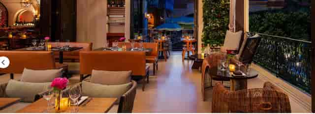 Stylish restaurant dining room with elegant decor for intimate gatherings and corporate events.