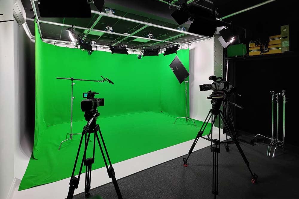 Live Stream Studio with green screen setup for virtual events and video production.