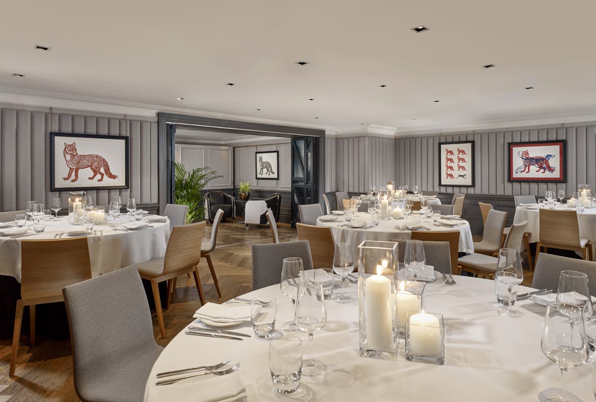 Sophisticated dining setup in The Gallery, Holmes Hotel London for corporate events.