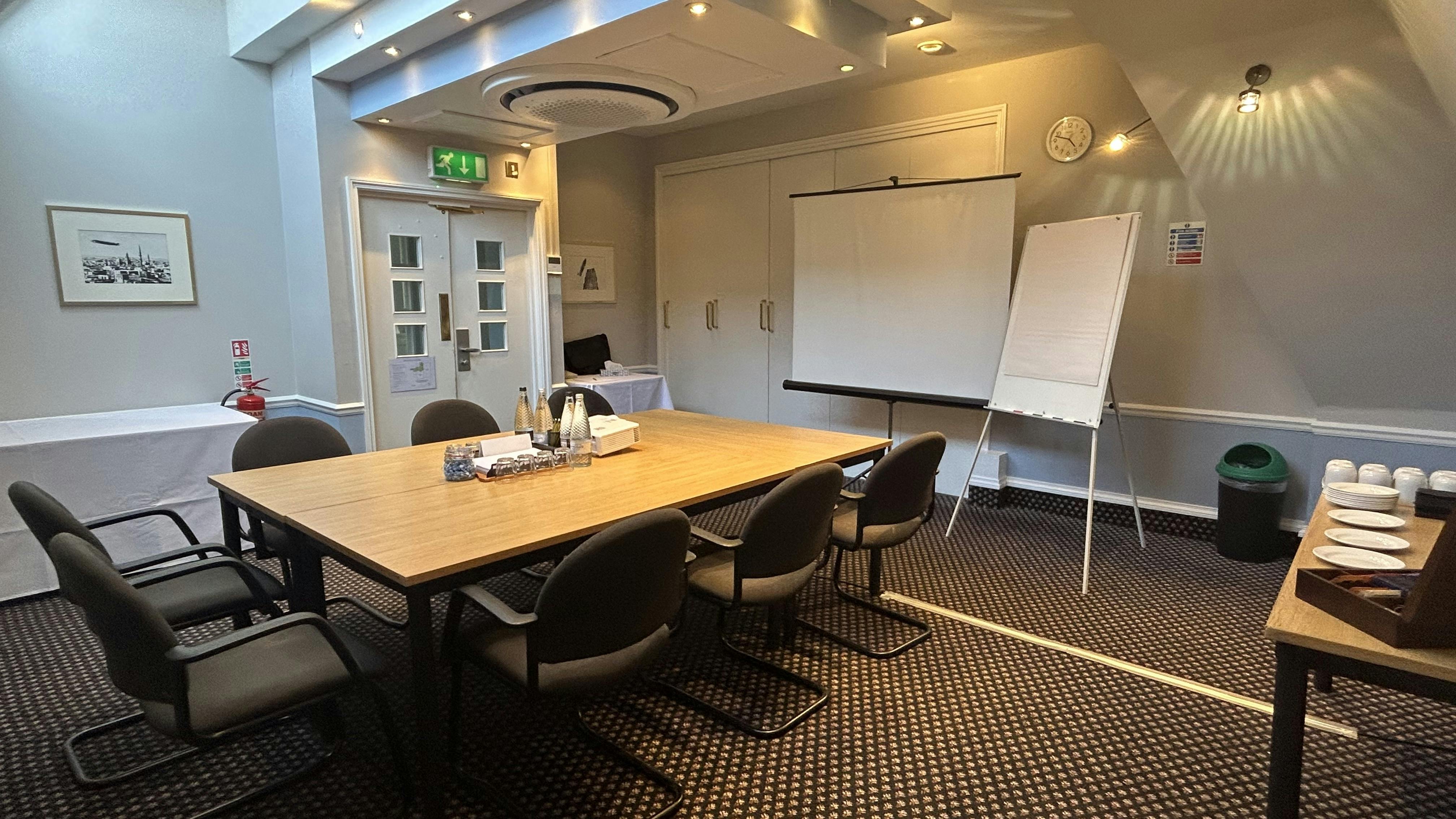 Meeting room at Mercure Brighton with natural light, ideal for workshops and strategy sessions.