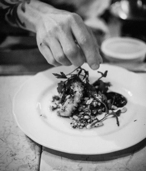 Gourmet dish at Il Buco, showcasing culinary artistry for event catering.