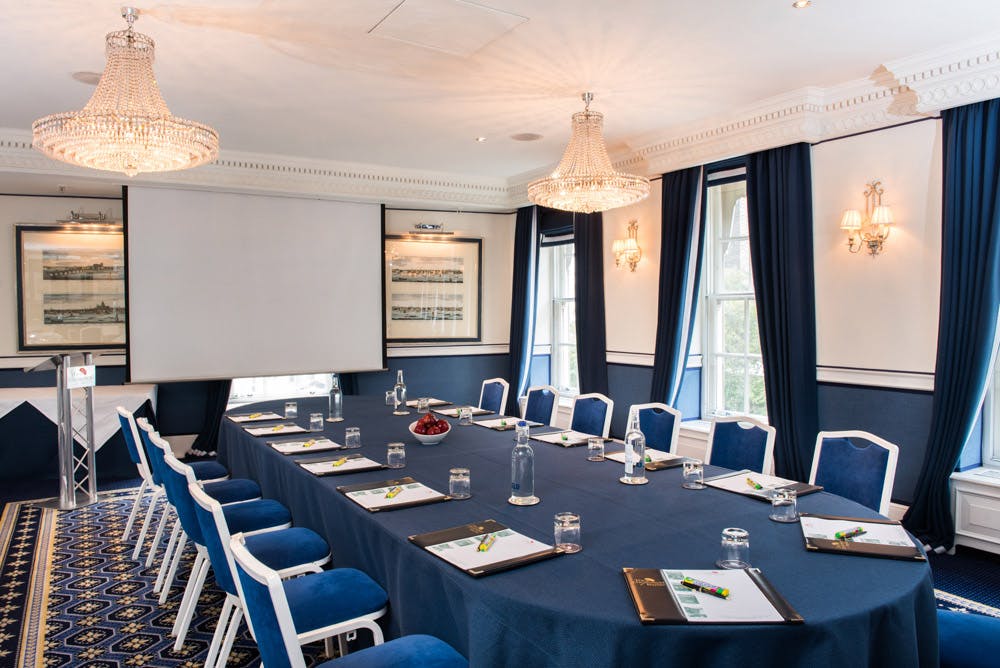 Queen Suite meeting room at Chesterfield Mayfair Hotel, elegant table, professional gatherings.