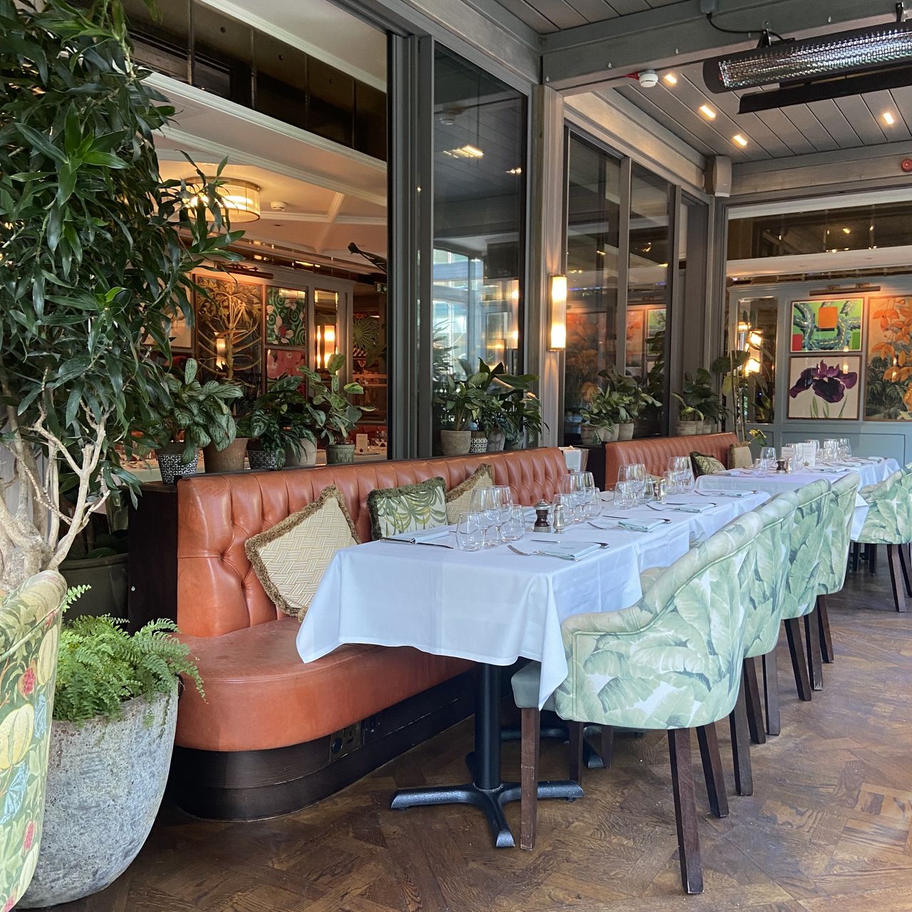 Elegant dining space at The Ivy In The Park, perfect for upscale events and gatherings. - Banner