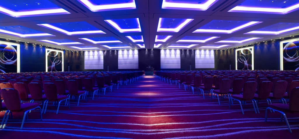 Salon Privé event venue in London with modern decor, ideal for corporate conferences.