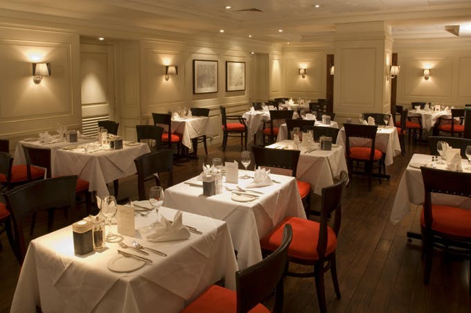 Londinium Restaurant dining space, elegant setting for corporate dinners and events.