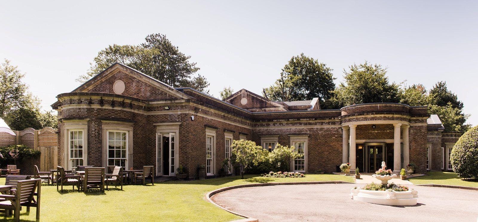 Manor House at De Courceys Manor: elegant venue for weddings and corporate events.