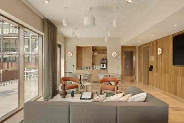 Modern meeting space at Sixth Floor Lounge, Myo New Street Square, ideal for gatherings.