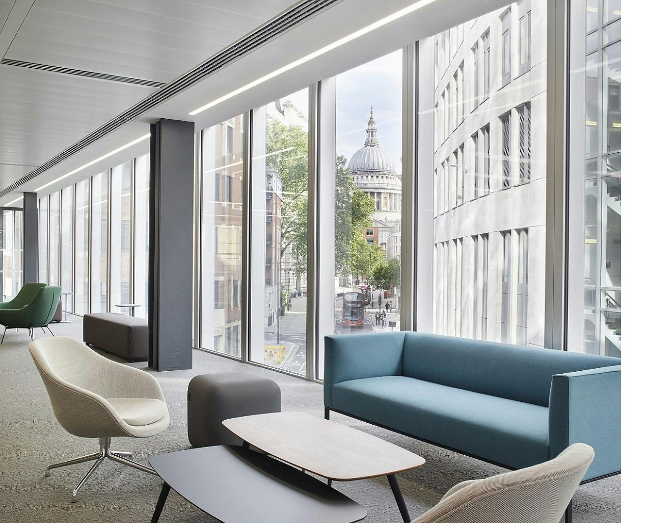 Modern 1st Floor Lounge at London Conference Centre with St. Paul's view, ideal for meetings.