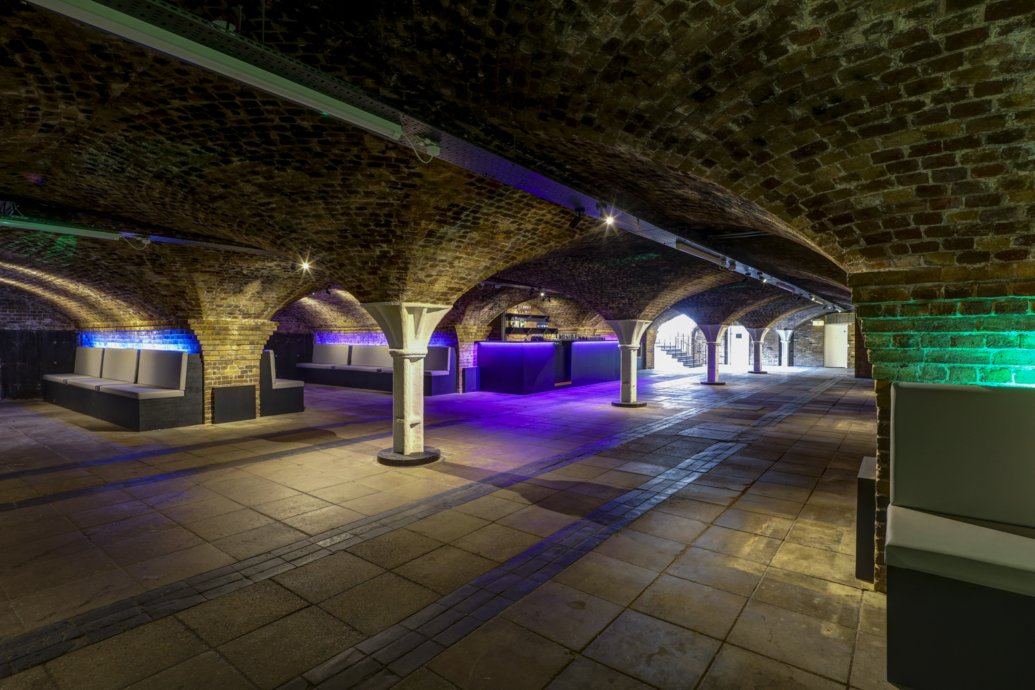 Princess Diana Exhibition in Dockside Vaults with arched brick ceilings, ideal for events. - Banner