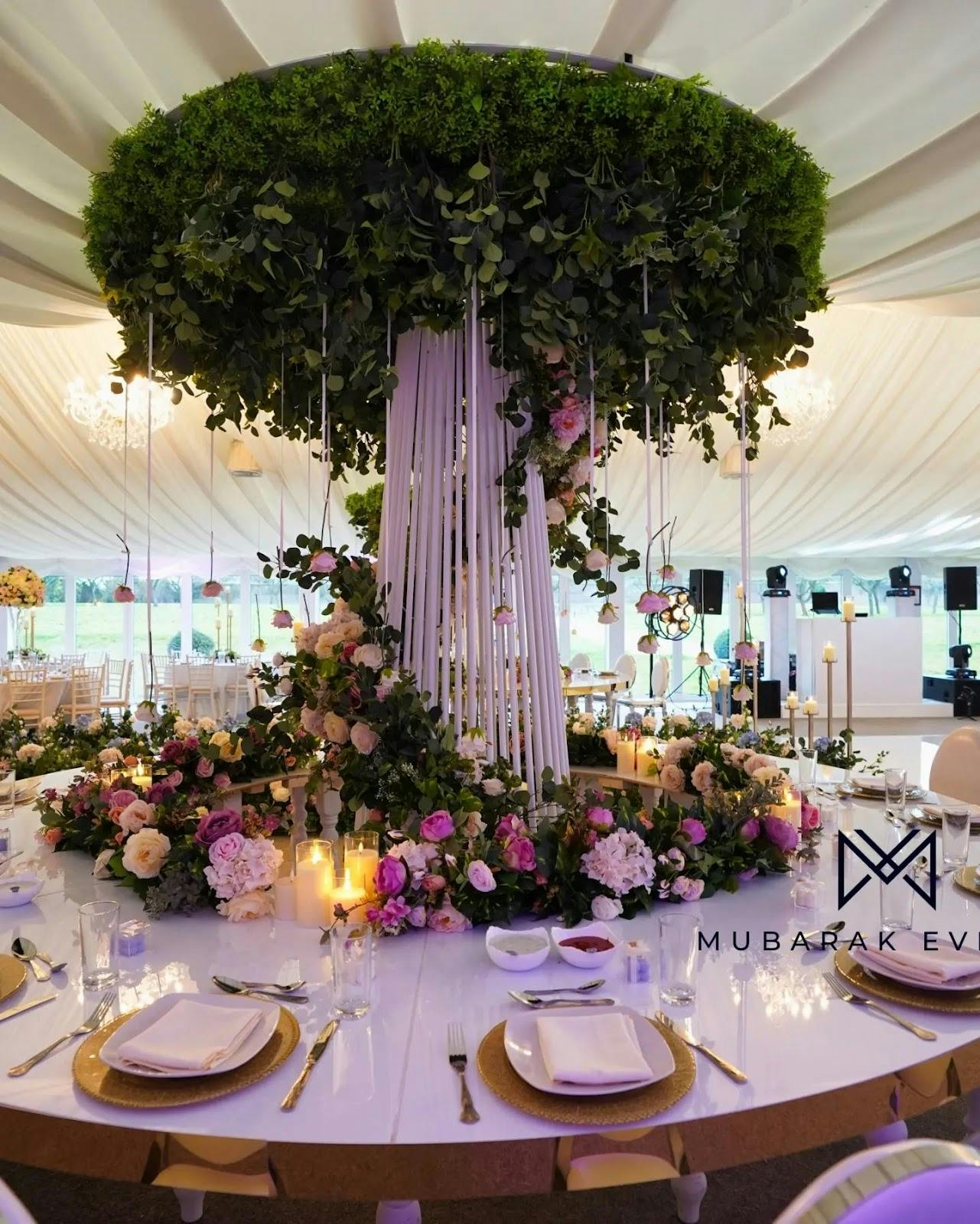 Elegant event space with floral centerpiece, perfect for weddings and upscale gatherings.