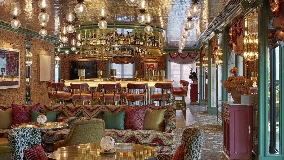 Stylish event space with chic bar, ideal for networking and cocktail receptions.