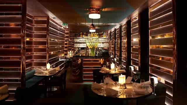Elegant dining space on Casa Cruz London roof terrace, perfect for upscale events and networking.