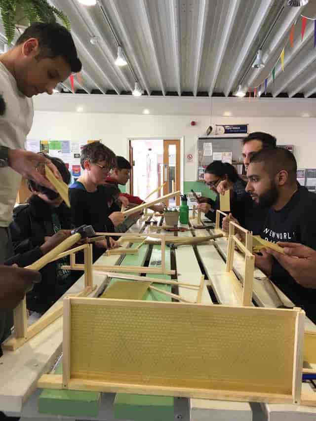 Participants engaged in a hands-on workshop at Bee.Spoke Learning Centre for team-building.
