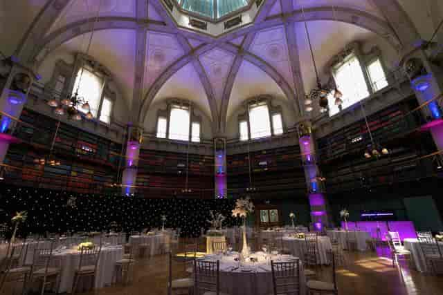 Elegant event space with high ceilings for weddings and corporate gatherings.