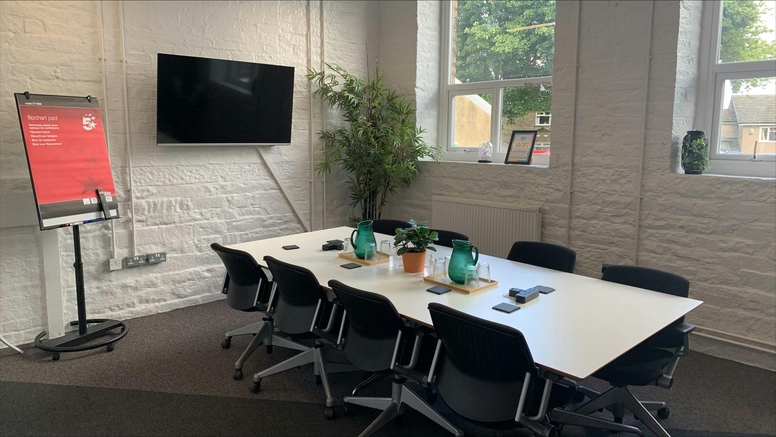 Beck Mill meeting room with spacious table, ideal for collaborative meetings and brainstorming.