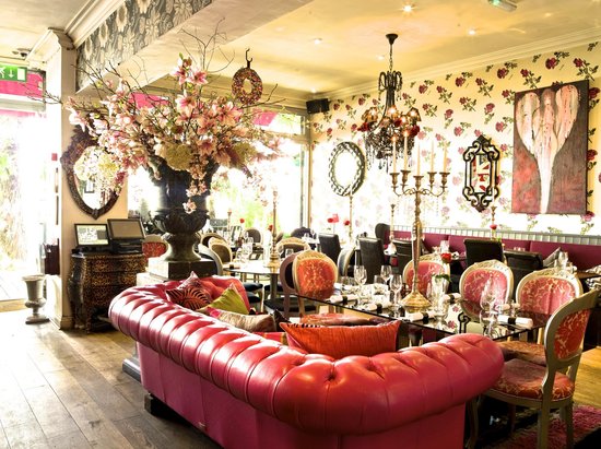 Private dining room at Rock & Rose Restaurant with elegant decor for upscale events. - Banner