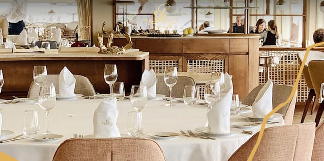 Sophisticated dining setup in Porto Santa Maria for corporate events and private gatherings.