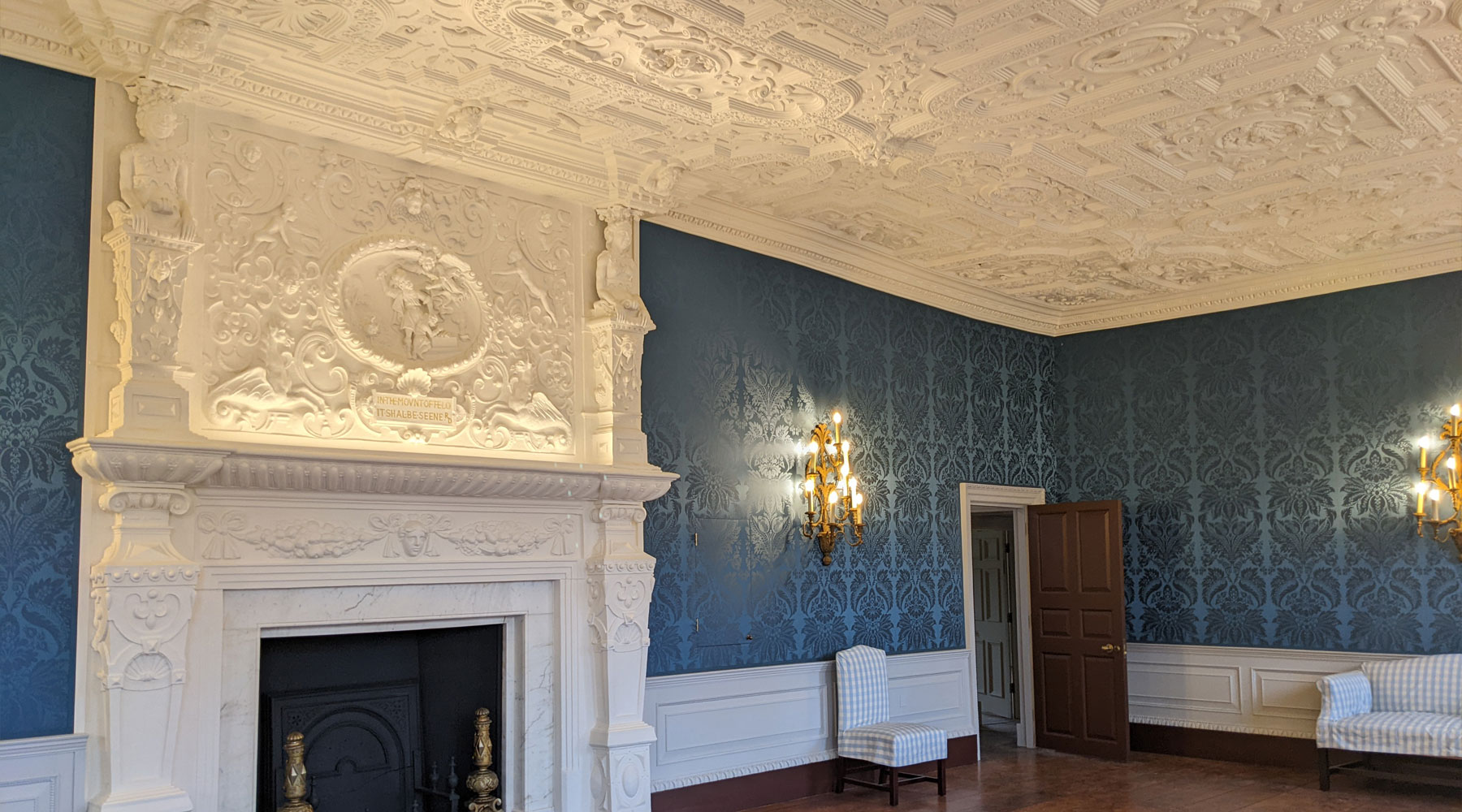 Elegant Boston Manor House meeting space with ornate plasterwork and blue wallpaper. - Banner