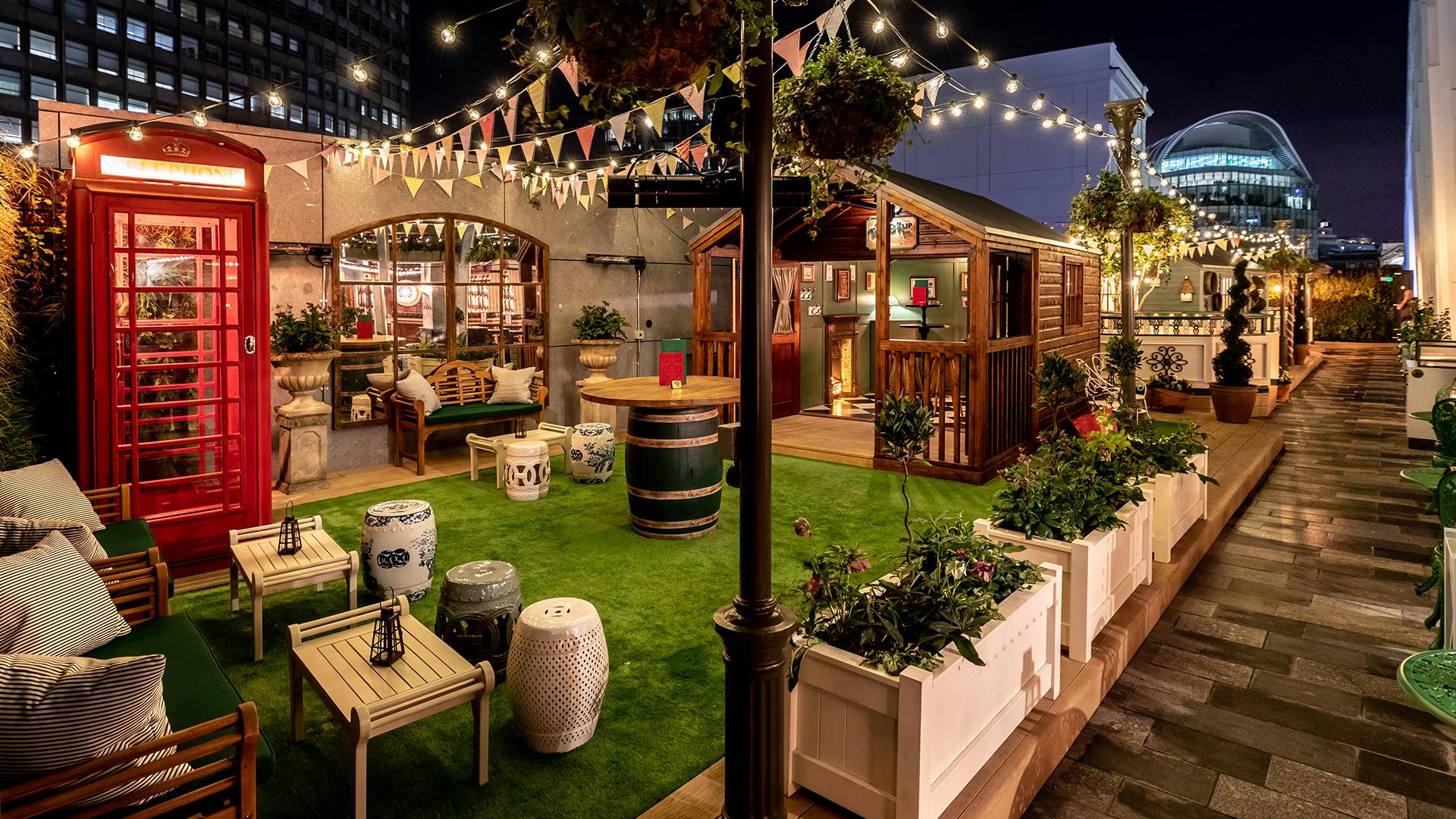 Vibrant beer garden with string lights, perfect for casual gatherings and networking events.