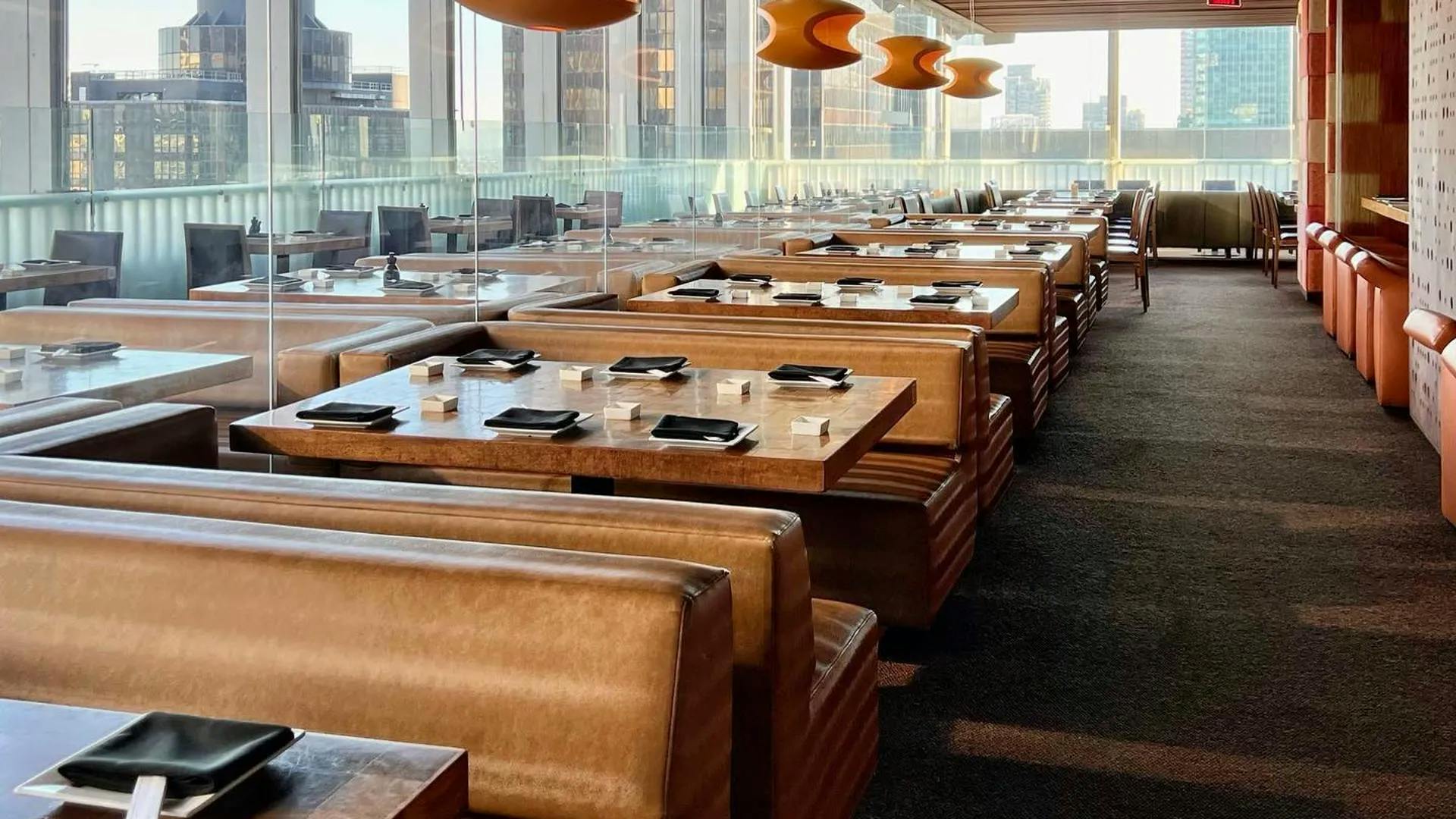 Modern dining space at Takami Sushi Rooftop, ideal for corporate events and gatherings.