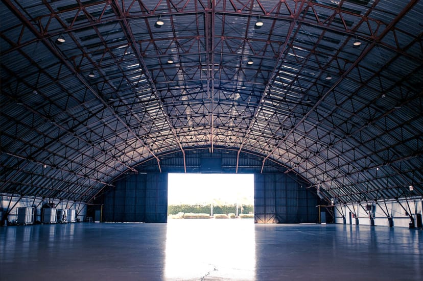 Spacious industrial venue in California for events with high arched ceiling and natural light.