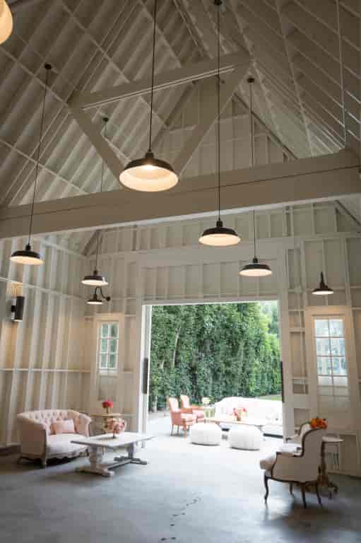 Modern rustic barn venue with high ceilings for workshops and receptions.