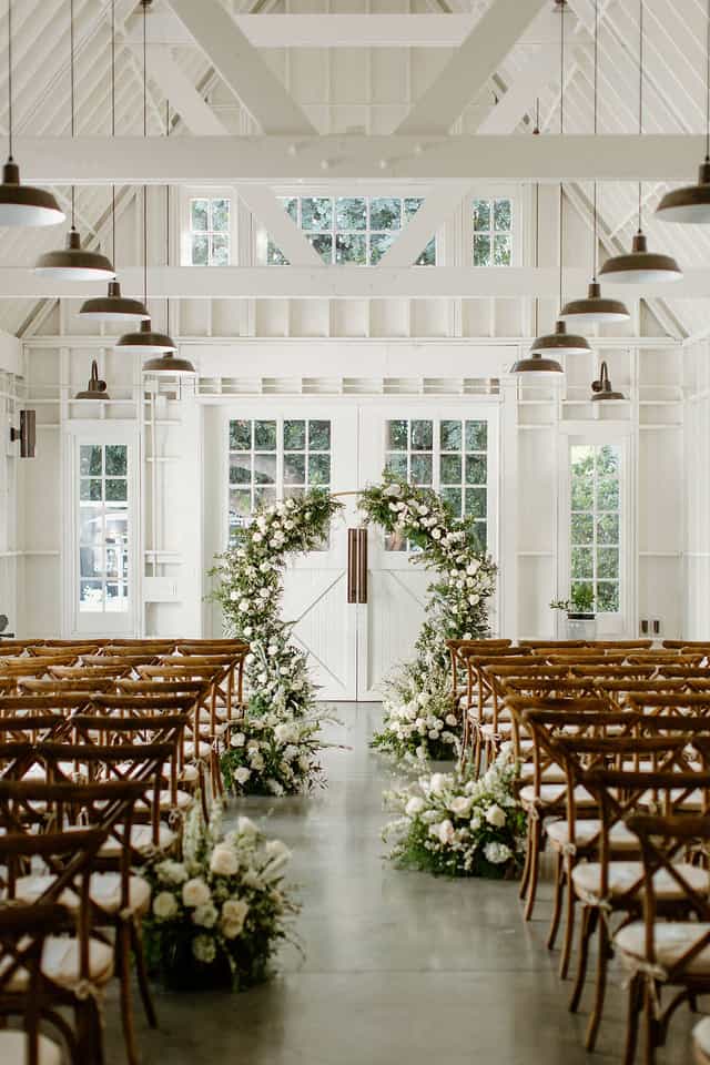 Elegant Lombardi House event space with floral decor, ideal for weddings and gatherings.