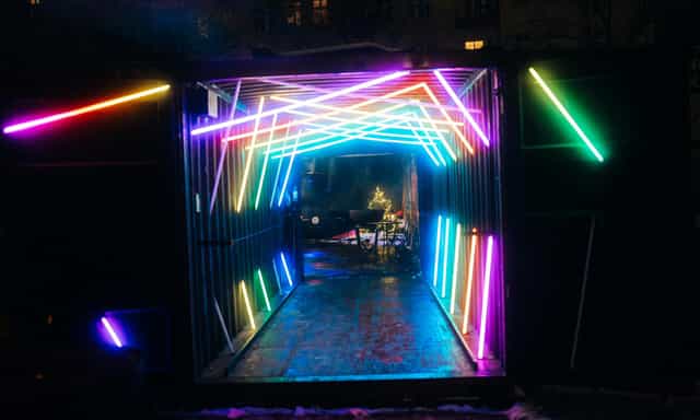 Vibrant neon-lit entrance at TABULA RASA for engaging modern events.
