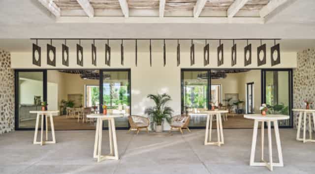 Stylish event space at Susurros del Corazón with modern decor for receptions and networking.