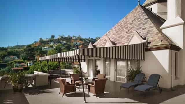 Chateau Marmont outdoor terrace with stylish furniture for intimate gatherings and events.