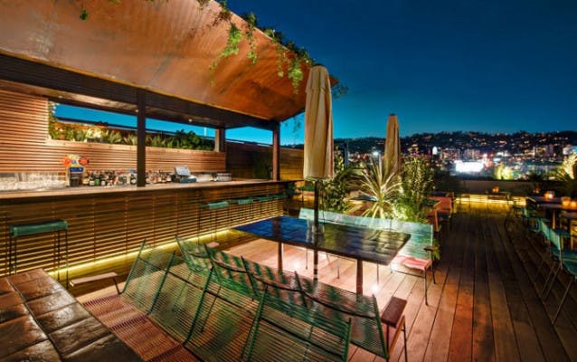 Stylish rooftop venue with city view, perfect for events and gatherings.