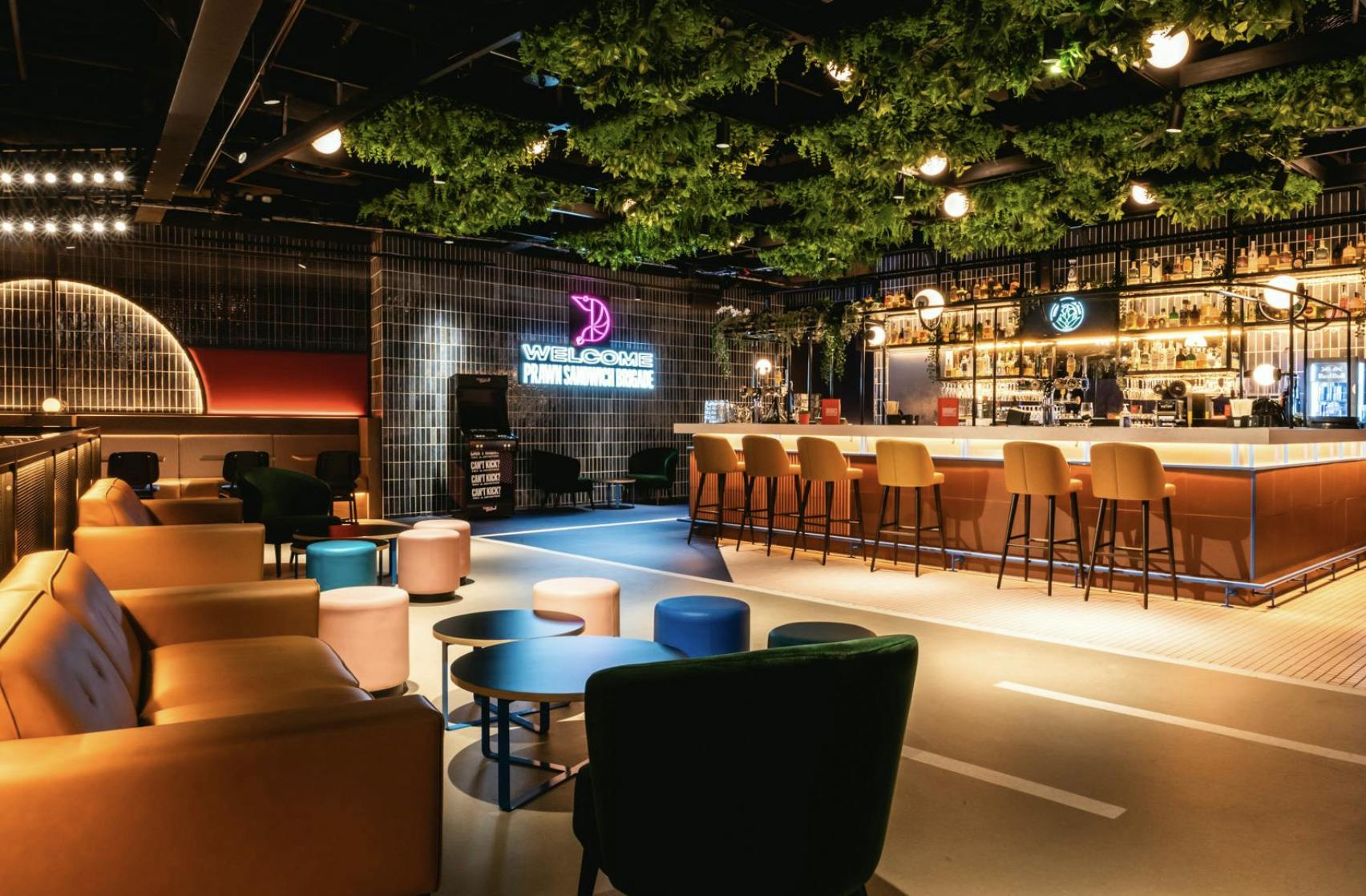 Modern event space at TOCA Social Birmingham with vibrant bar and seating for gatherings.