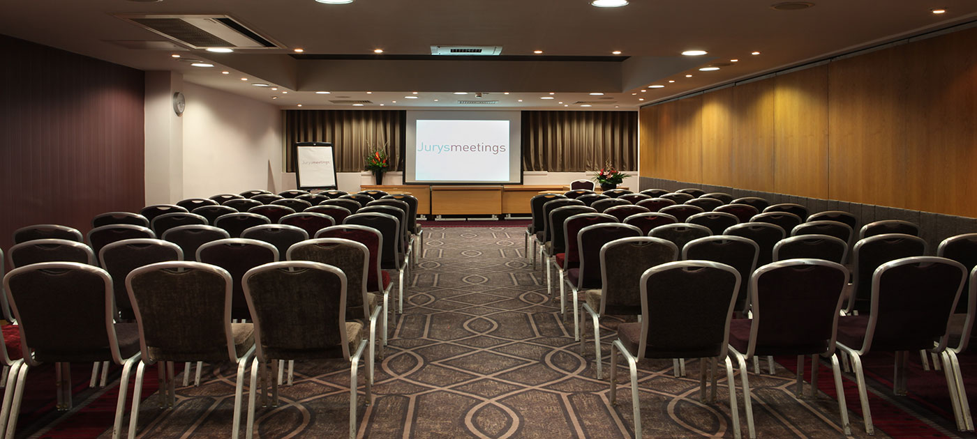 Meeting room at Leonardo Royal Hotel Birmingham with theater seating for corporate events. - Banner