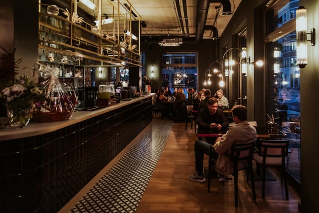 Stylish KOKO venue with warm lighting, perfect for networking events and meetings.