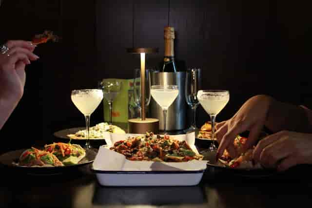 Stylish dining setup at BASEMENT, Boogalú for networking events and intimate gatherings.