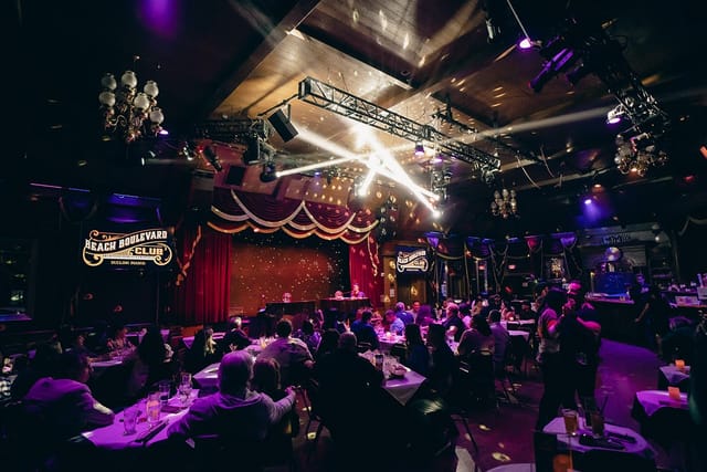 Main Theater at Beach Boulevard Club, elegant setup for lively events and performances.