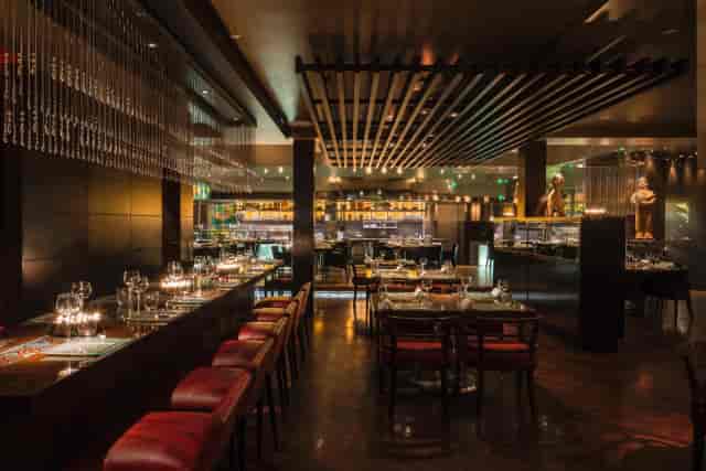 Private dining room at Amaya Grill, elegant decor for upscale events and gatherings.