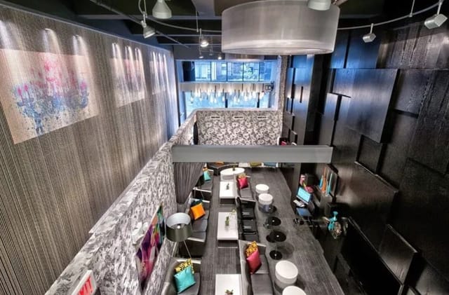 Modern event space with sleek design, ideal for networking and cocktail receptions.