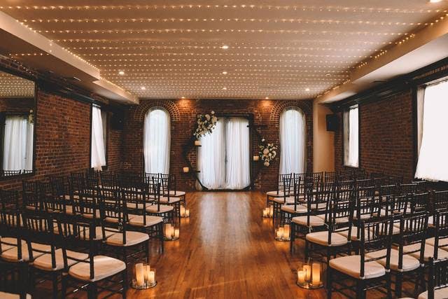 Elegant banquet hall with soft lighting, perfect for weddings and intimate gatherings.