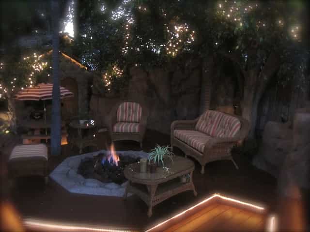 Cozy Gazebo Bar with fire pit, perfect for intimate gatherings and networking events.