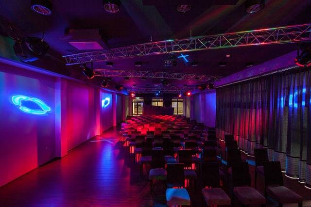 LED wall in modern event space with vibrant lighting for corporate and social gatherings.