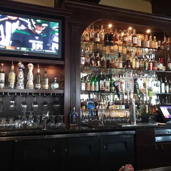 The Heights Restaurant bar with diverse drinks, ideal for networking and social events.