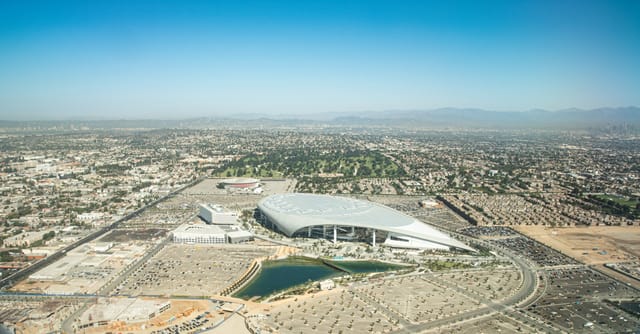 SoFi Stadium: modern venue with water feature, ideal for conferences and sports events.