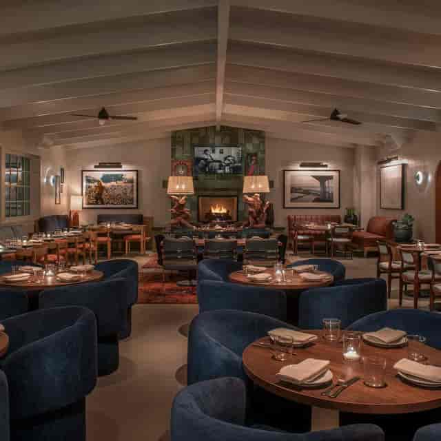 Game Room at The Bungalow Long Beach, cozy fireplace, ideal for upscale events and gatherings.