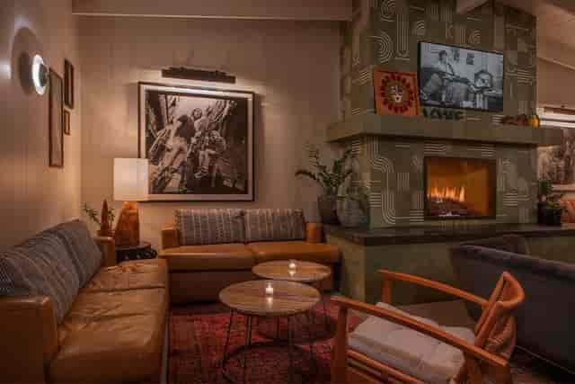 Cozy game room with fireplace, ideal for networking events in Long Beach.