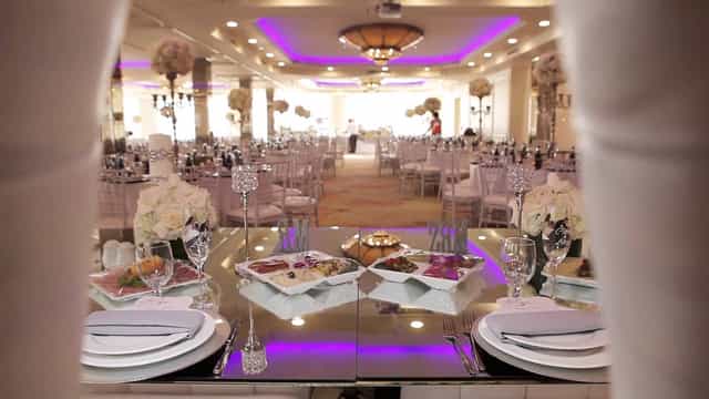 Elegant Brandview Ballroom banquet hall with fine china, perfect for weddings and corporate events.