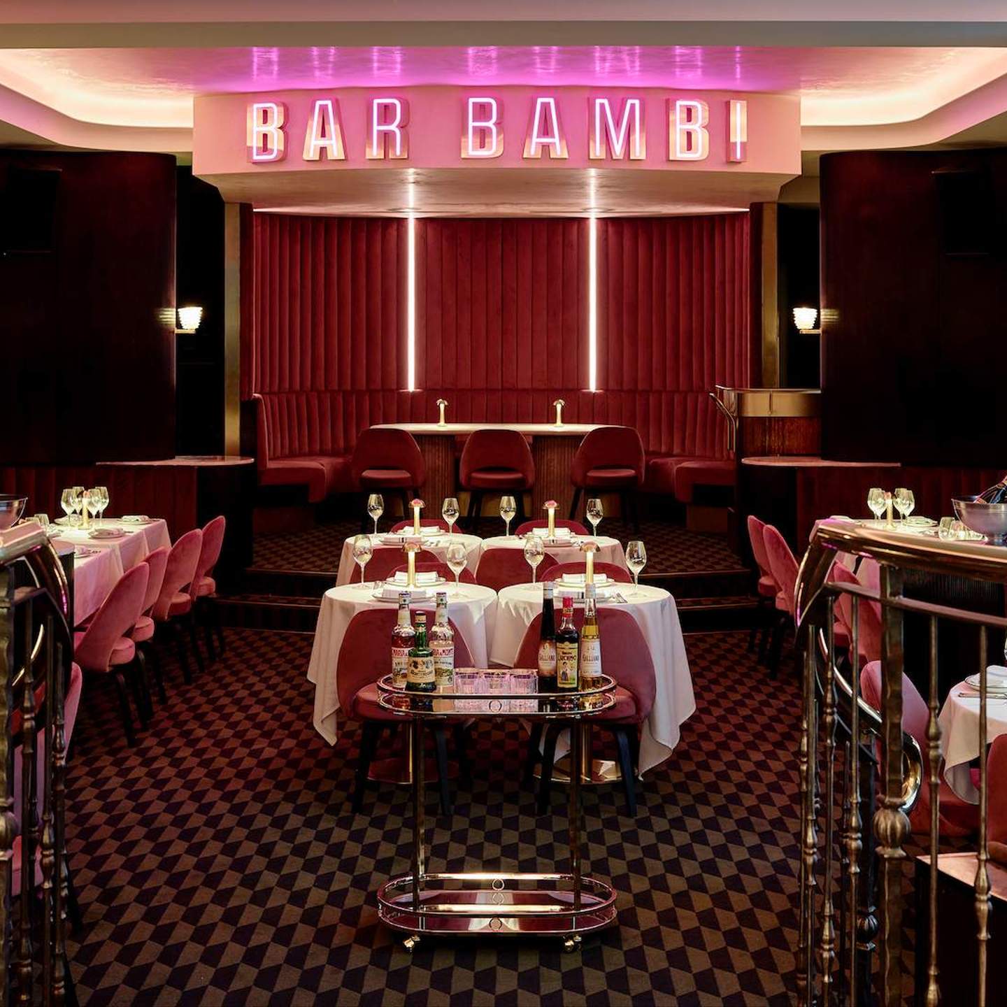 Intimate dining space with elegant tables, perfect for private events and networking dinners. - Banner