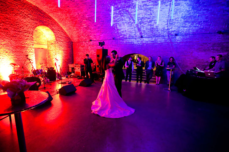 Vibrant wedding venue with dynamic lighting, perfect for celebrations and events. - Banner