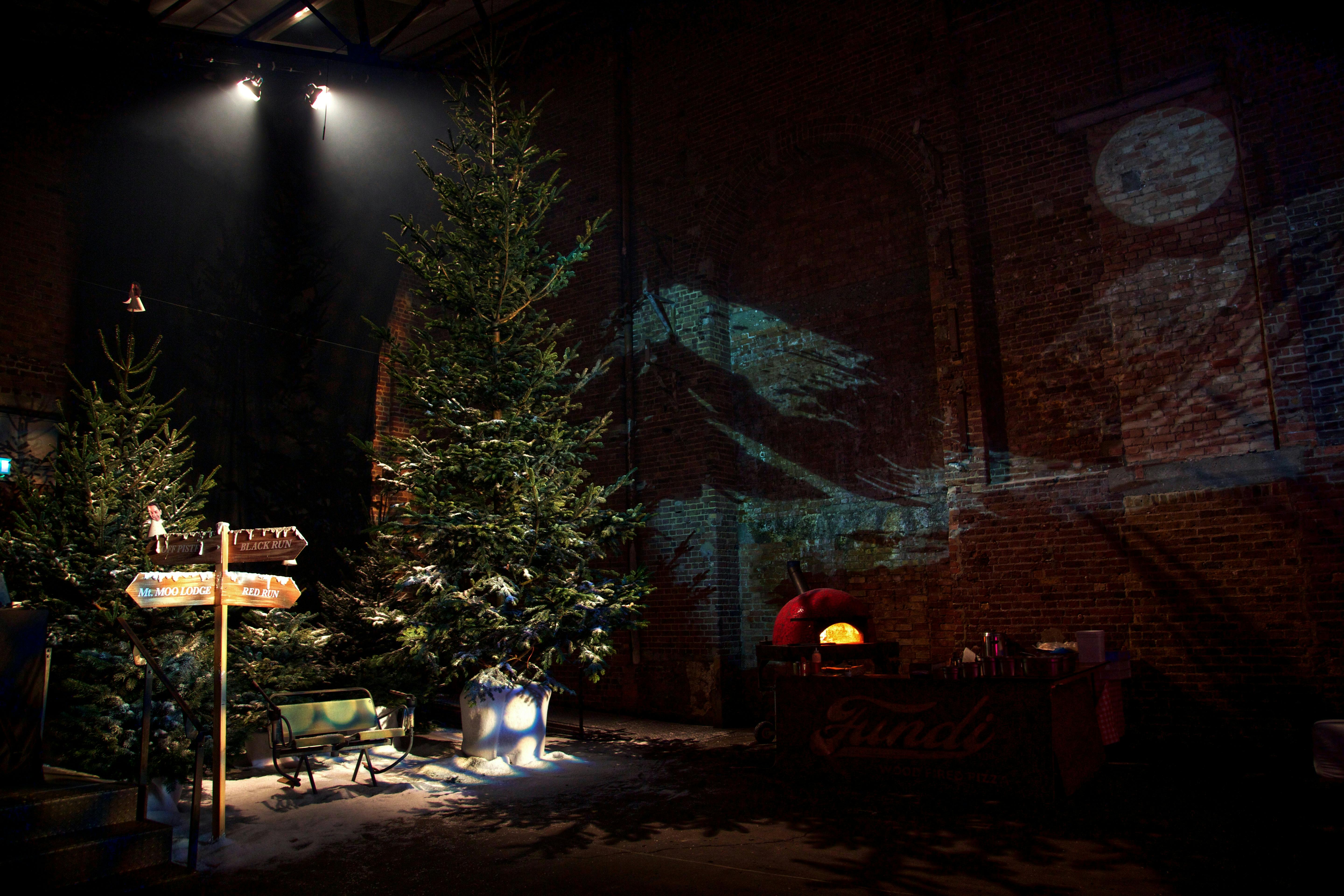 "Village Underground event space with Christmas trees and festive lighting for holiday gatherings."